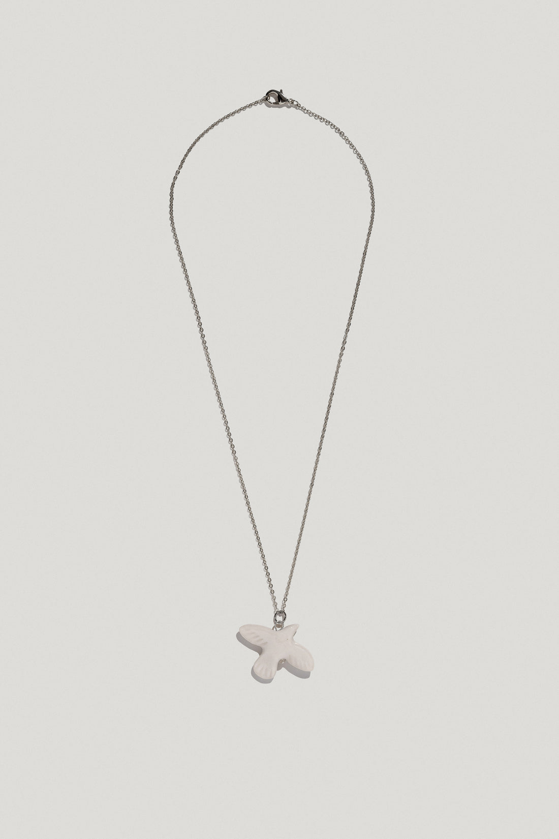 Myrni bird pendant on a chain