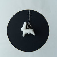 Luili Porcelain Bunny Pendant on a chain