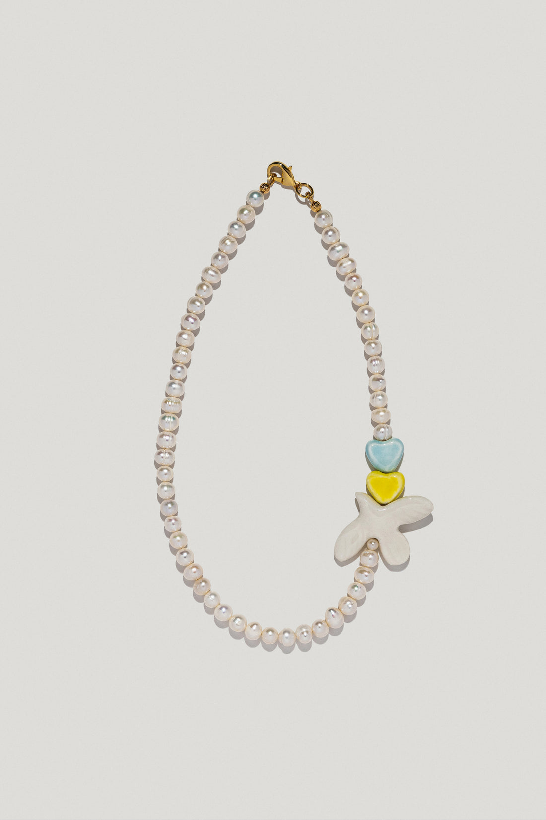 UA necklace with porcelain heart and bird