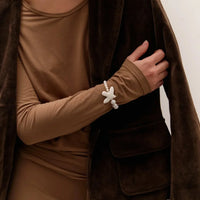 Myrni bracelet with two types of pearls and a porcelain bird