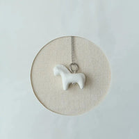 Luili Porcelain Horse Pendant on a chain