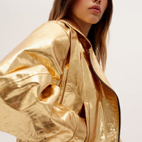 Leather biker jacket in gold