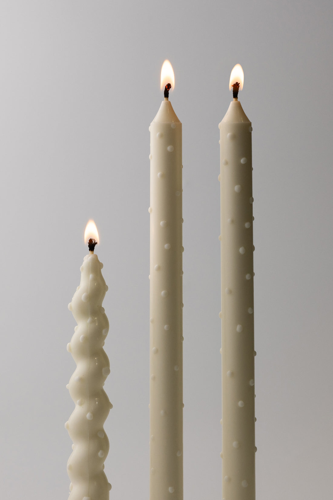 Dotted Taper Candles in white