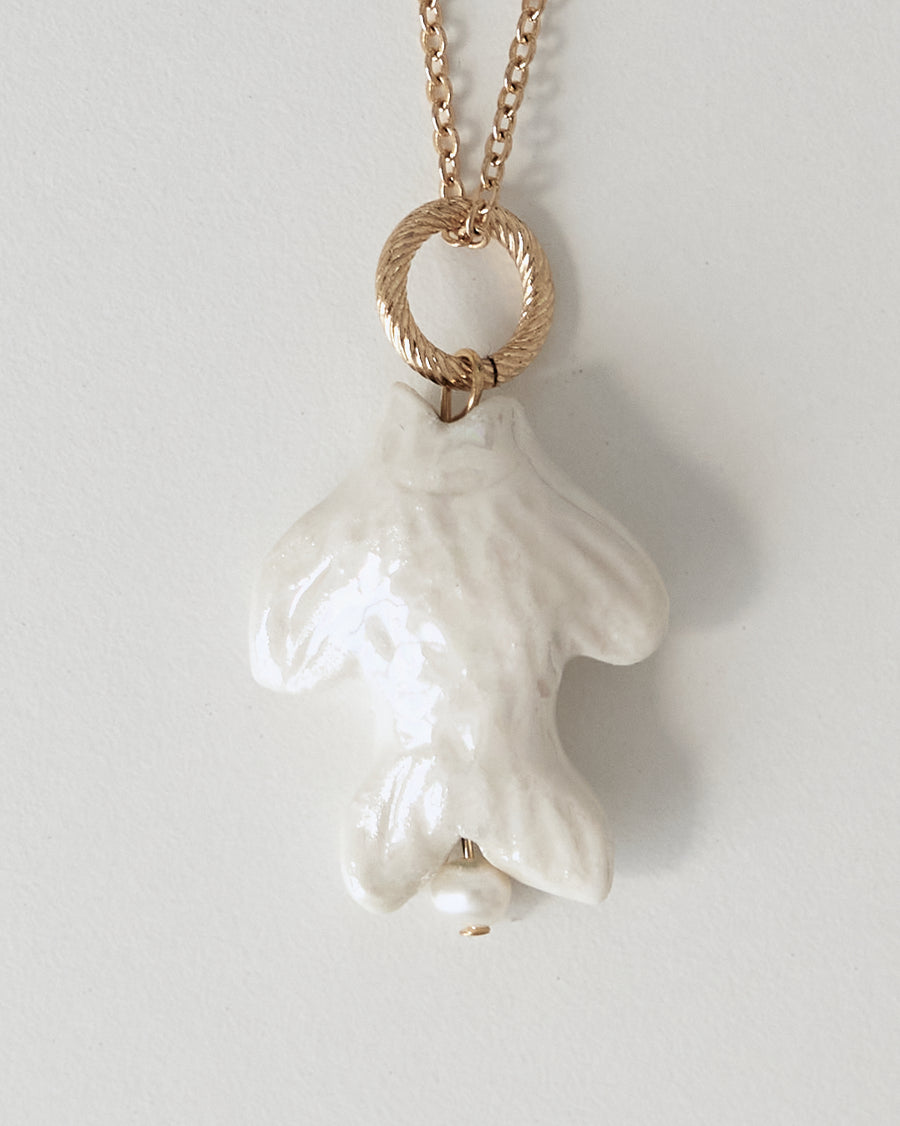 Khvyli white fish pendant on a chain