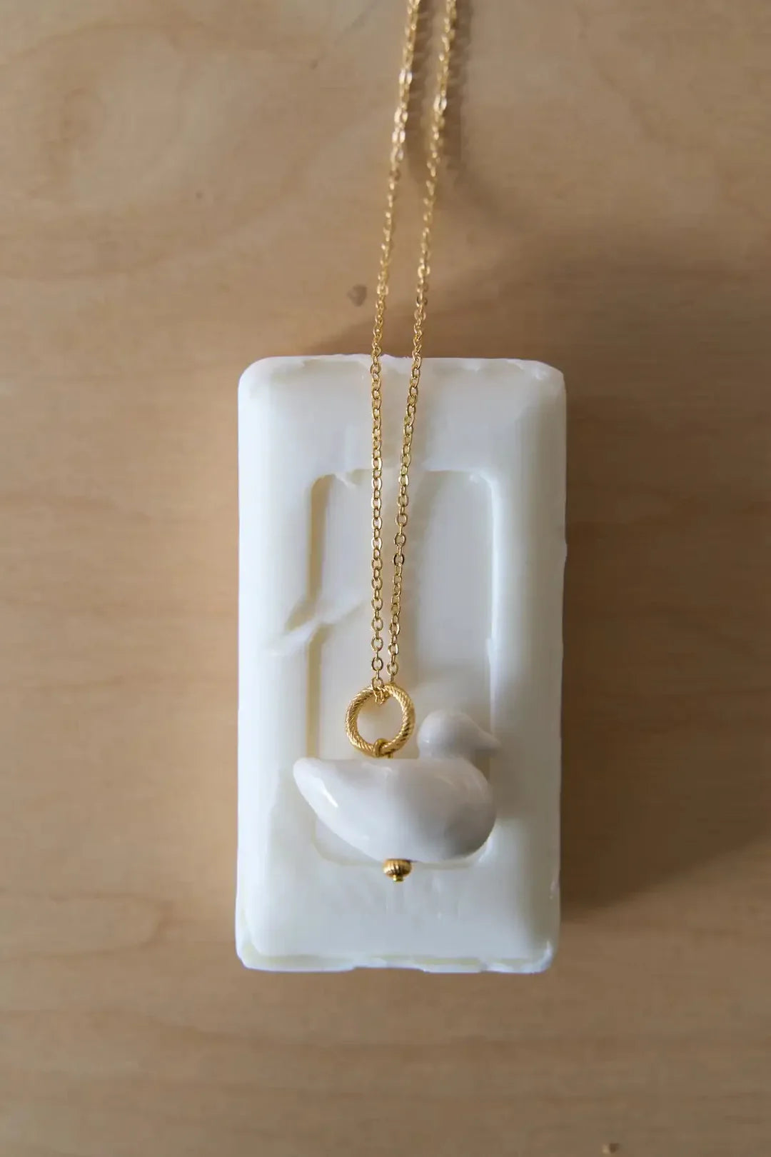 Luili Porcelain Duck Pendant on a chain