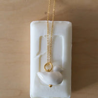 Luili Porcelain Duck Pendant on a chain