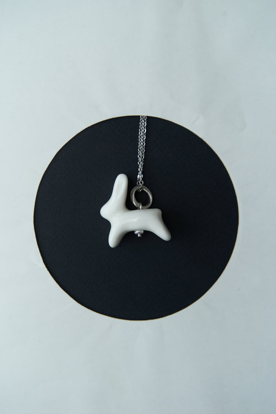 Luili Porcelain Bunny Pendant on a chain