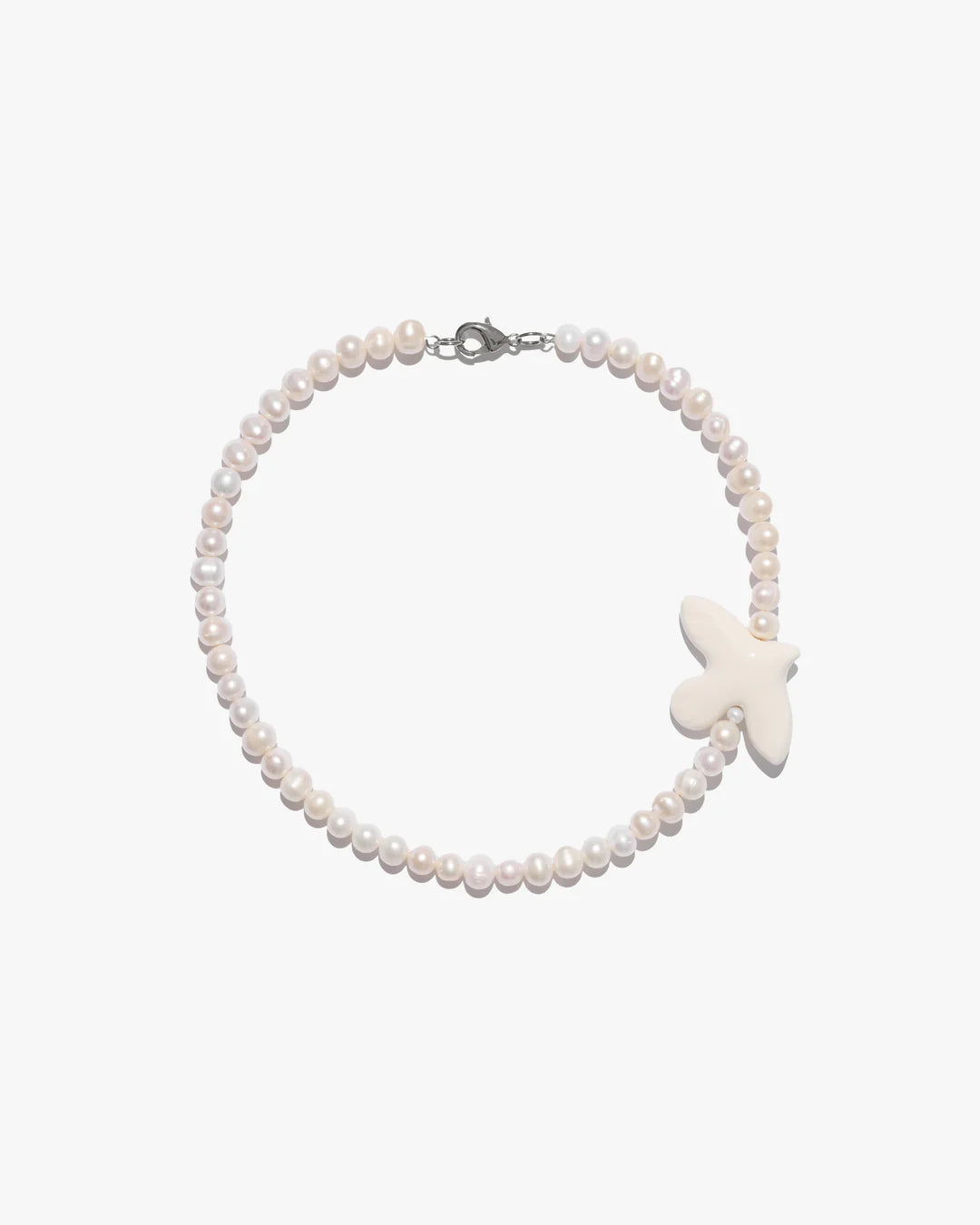 Myrni necklace with medium-sized pearls and porcelain bird