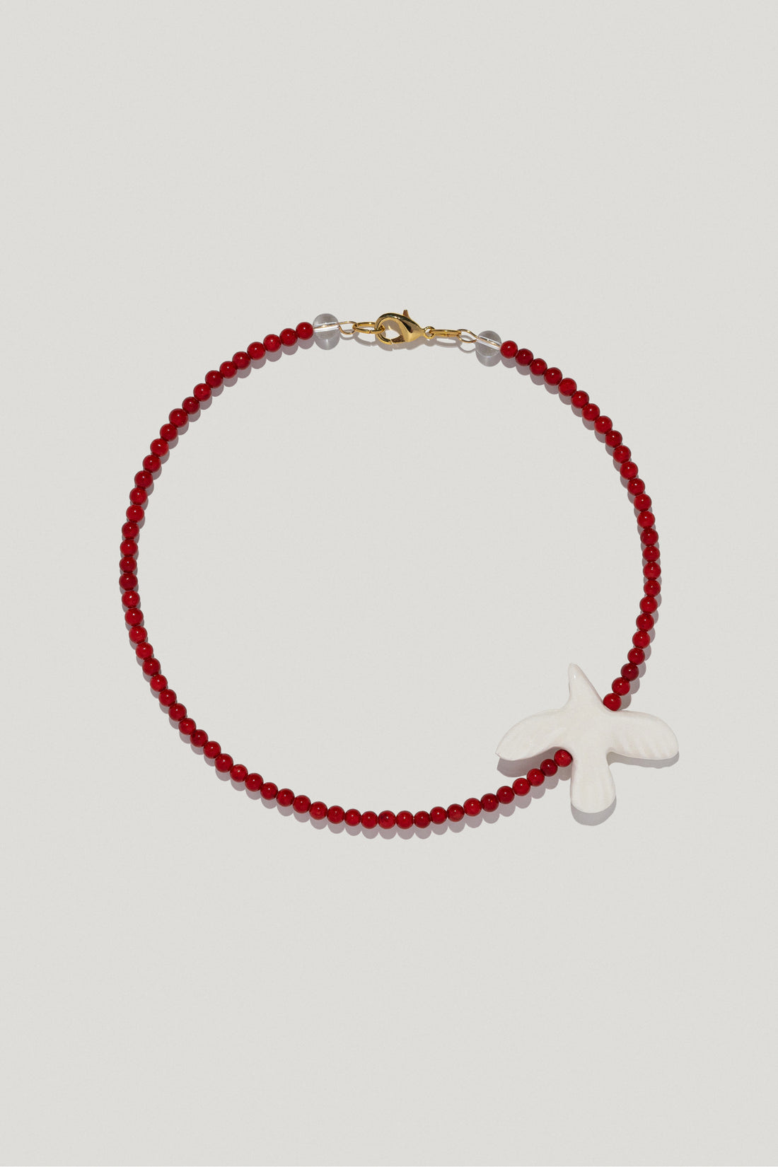 Myrni small-sized coral necklace with porcelain bird
