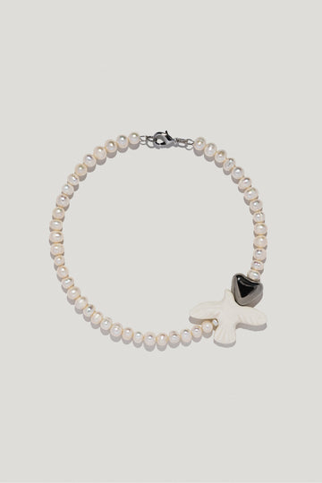 Skarb pearl necklace with porcelain bird and heart