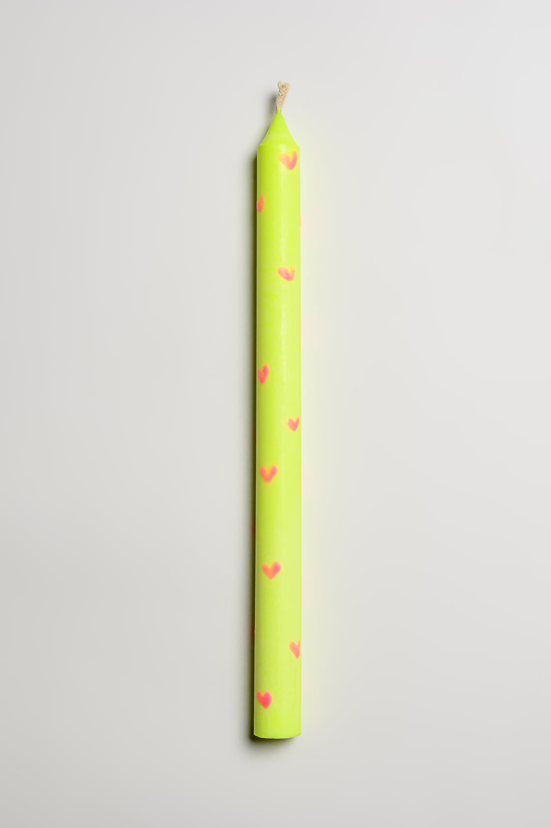 Pink Hearts Taper Candles in yellow