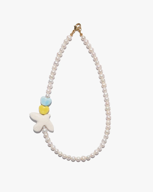 UA necklace with porcelain heart and bird