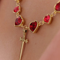 Sword and red hearts necklace