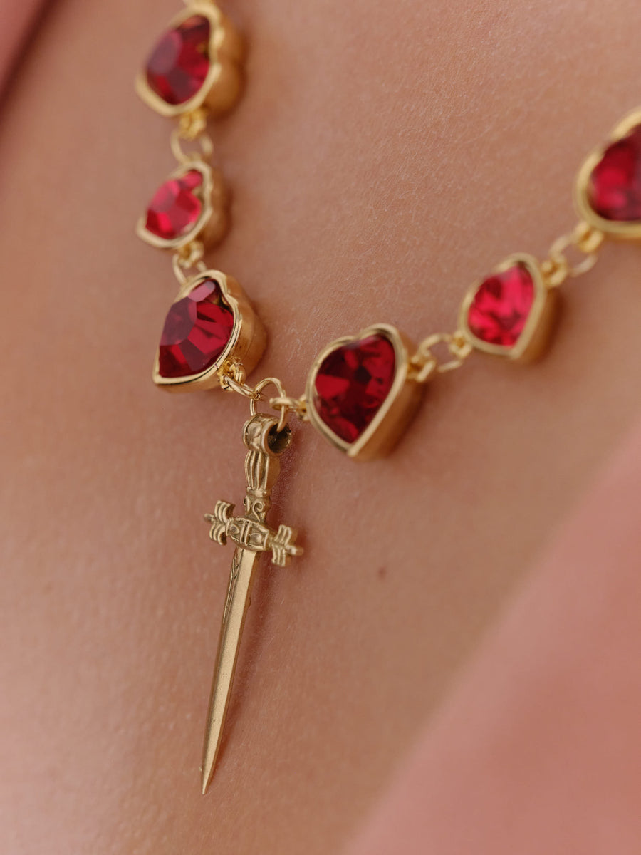 Sword and red hearts necklace