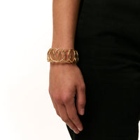 Karma Wide Bracelet in gold