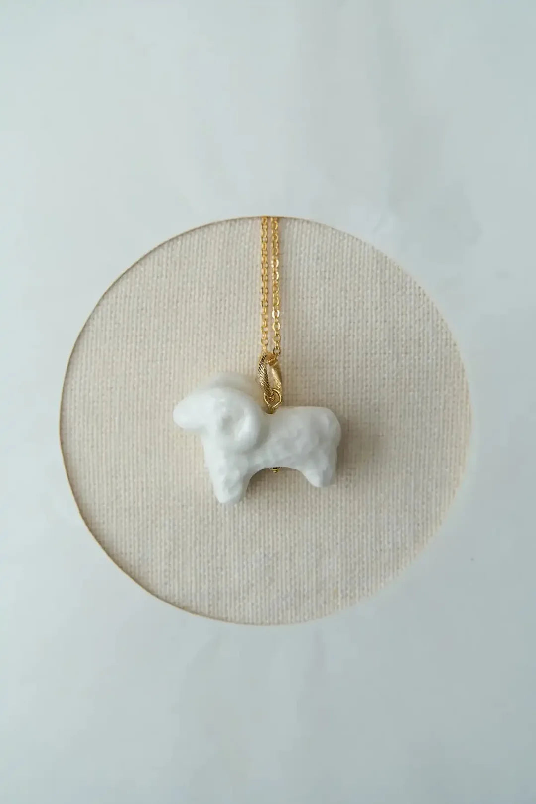 Luili Porcelain Sheep Pendant on a chain