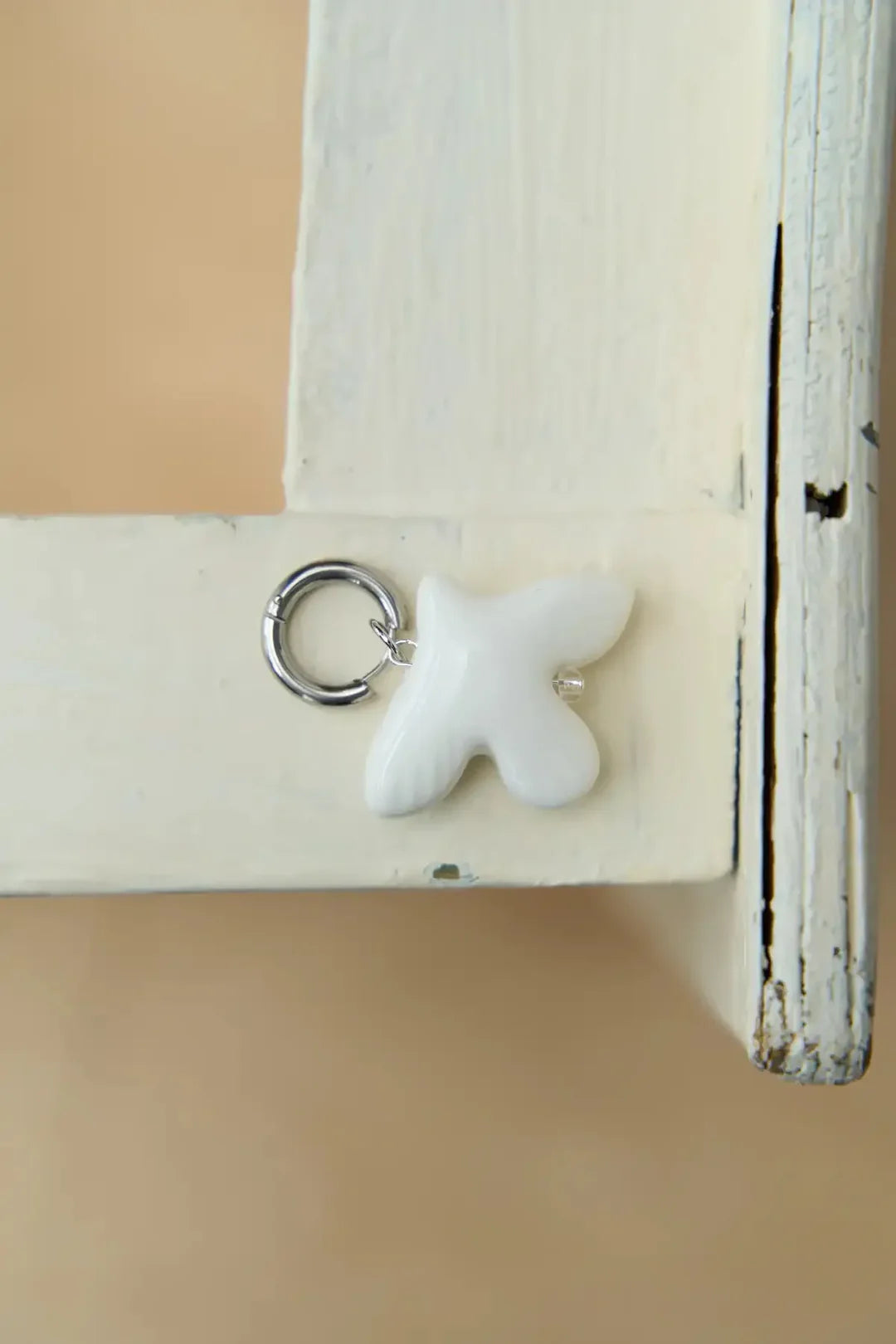 Myrni mono earring with porcelain bird