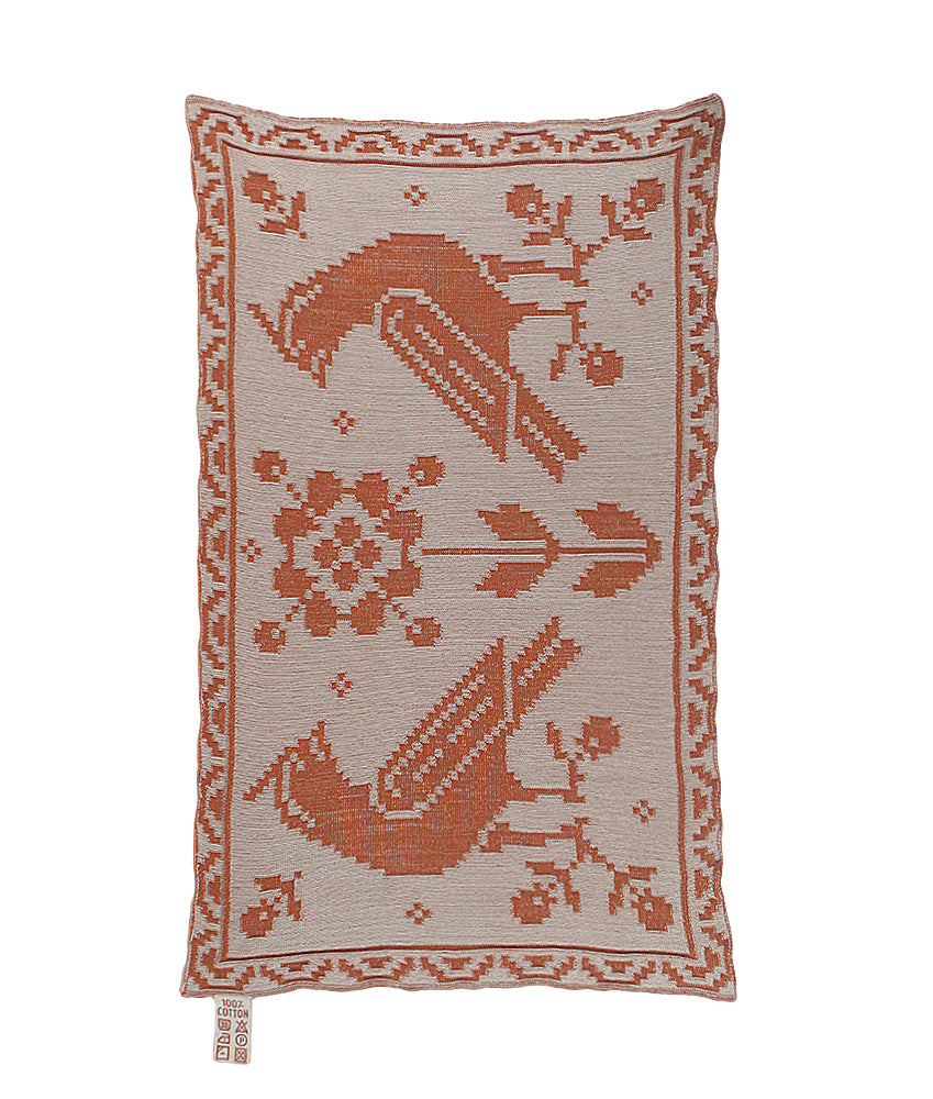 Blanket with birds and flowers in rust