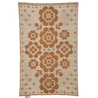 Blanket with hollyhocks in rust